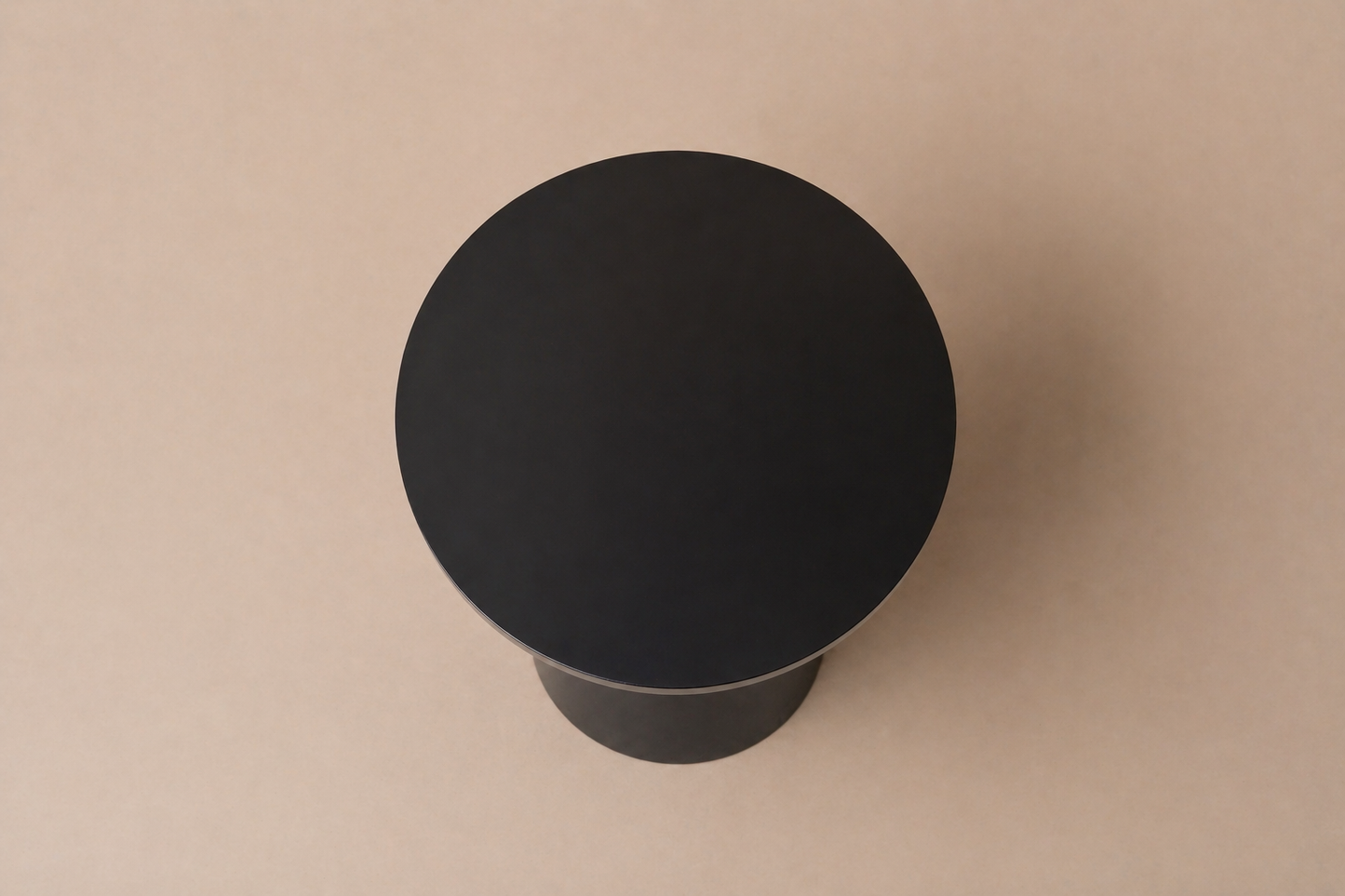 The Onyx Hourglass Pedestal Table